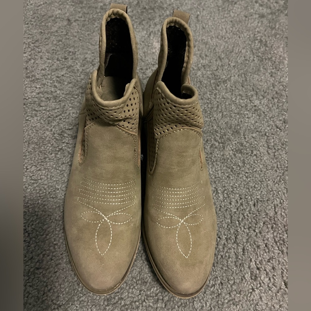 Western style boots with small heel.
